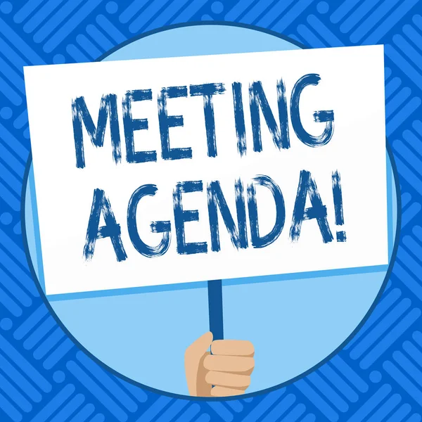 Text sign showing Meeting Agenda. Conceptual photo list items that participants hope to accomplish at meetings Hand Holding Blank White Placard Supported by Handle for Social Awareness.