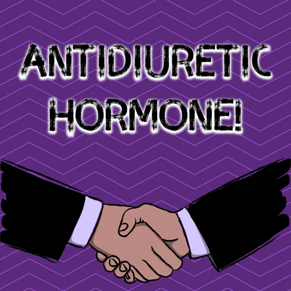 Conceptual hand writing showing Antidiuretic Hormone. Business photo text peptide molecule that is release by the pituitary gland Businessmen Shaking Hands Form of Greeting and Agreement.