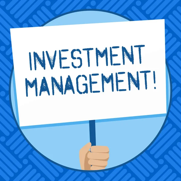 Text sign showing Investment Management. Conceptual photo analysisagement of investments for a financial institution Hand Holding Blank White Placard Supported by Handle for Social Awareness.