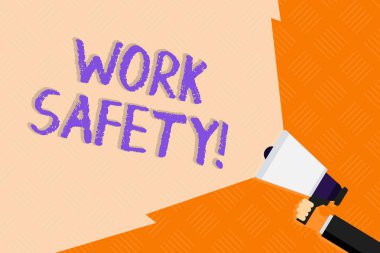Conceptual hand writing showing Work Safety. Business photo text policies and procedures in place to ensure health of employees Hand Holding Megaphone with Wide Beam Extending the Volume.