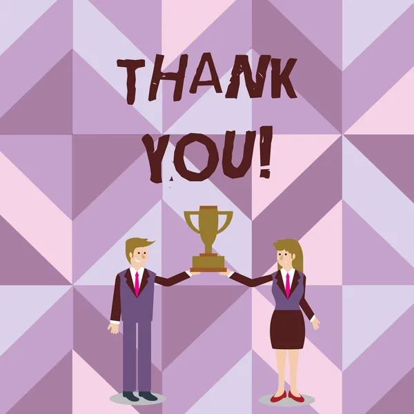 Handwriting text writing Thank You. Concept meaning polite expression used when acknowledging gift service compliment Man and Woman in Business Suit Holding Together the Championship Trophy Cup.