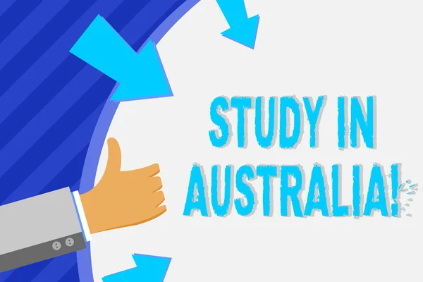 Conceptual hand writing showing Study In Australia. Business photo showcasing going into foreign country order complete your studies Hand Gesturing Thumbs Up Holding on Round Shape with Arrows. — Stock Photo, Image