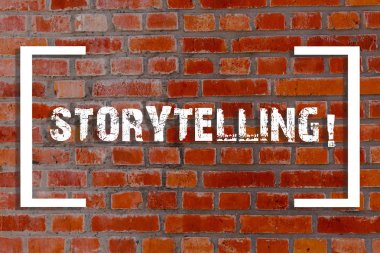 El yazısı metin Storytelling. Konsept anlam aktivite duvar üzerine yazılmış Graffiti motivasyonel çağrı gibi kamu tuğla duvar sanatı onları yayınlamak için hikayeler yazma.