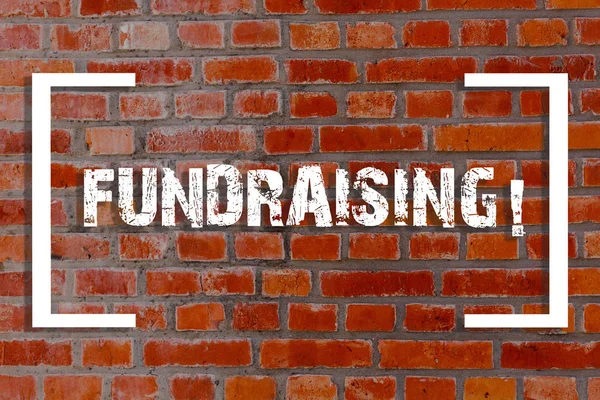Handwriting text Fundraising. Concept meaning seeking to generate financial support for charity or cause Brick Wall art like Graffiti motivational call written on the wall. — Stock Photo, Image