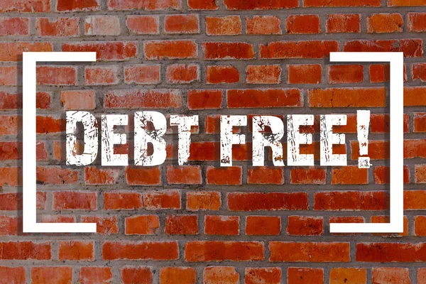 Handwriting text Debt Free. Concept meaning does not owning any money or things to any individual or companies Brick Wall art like Graffiti motivational call written on the wall.