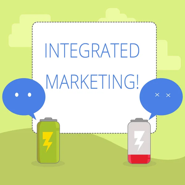 Word writing text Integrated Marketing. Business concept for creating unified and seamless experience for consumers Fully Charged and Discharged Battery with Two Colorful Emoji Speech Bubble.