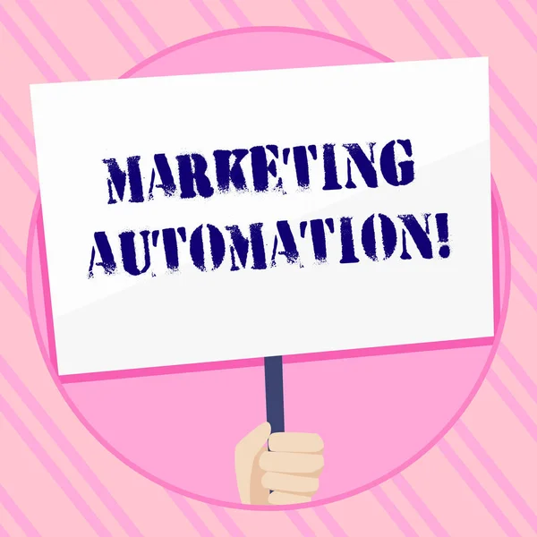 Text sign showing Marketing Automation. Conceptual photo Software used by company to effectively target customer Hand Holding Blank White Placard Supported by Handle for Social Awareness.