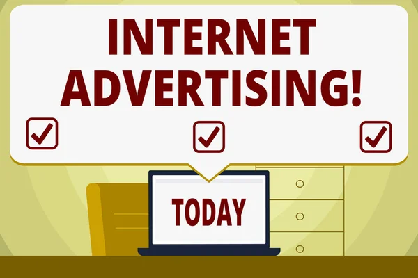 Conceptual hand writing showing Internet Advertising. Business photo showcasing uses the Internet to deliver promotional marketing Speech Bubble Pointing White Laptop Screen in Workspace Idea.