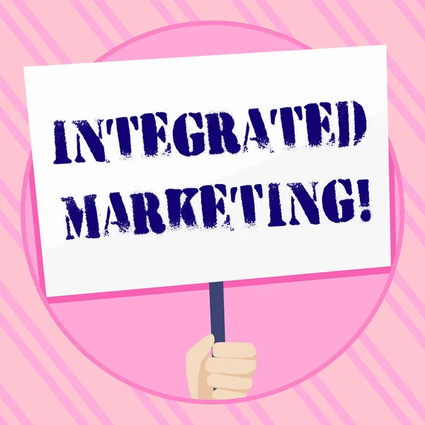 Text sign showing Integrated Marketing. Conceptual photo creating unified and seamless experience for consumers Hand Holding Blank White Placard Supported by Handle for Social Awareness.