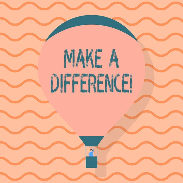 Conceptual hand writing showing Make A Difference. Business photo text have significant effect or non on demonstrating or situation Hot Air Balloon Floating with Passenger Waving From Gondola. — Stock Photo, Image