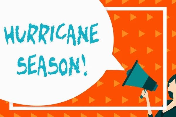 Writing note showing Hurricane Season. Business photo showcasing time when most tropical cyclones are expected to develop Speech Bubble Round Shape. Woman Holding Colorful Megaphone.