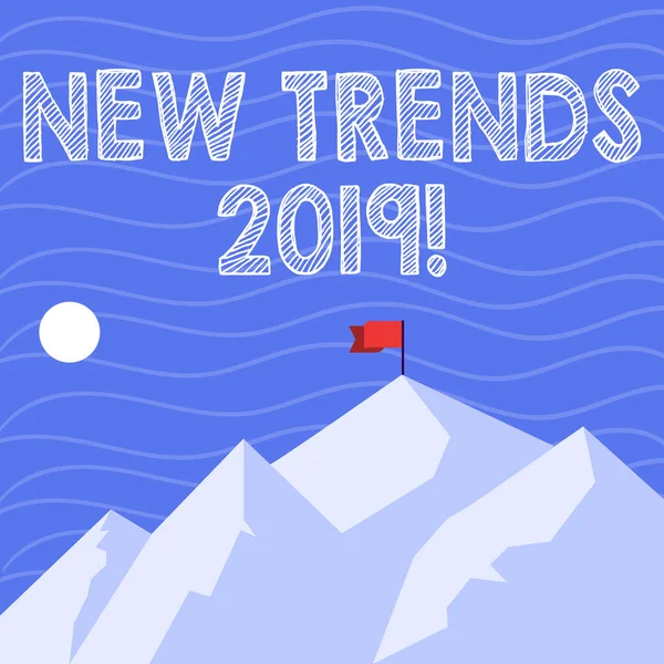 Szöveges jel mutatja New Trends 2019. Fogalmi fotó általános irány, ahol valami fejlődő hegyek árnyék jelző napszak és zászló banner egy csúcs. — Stock Fotó