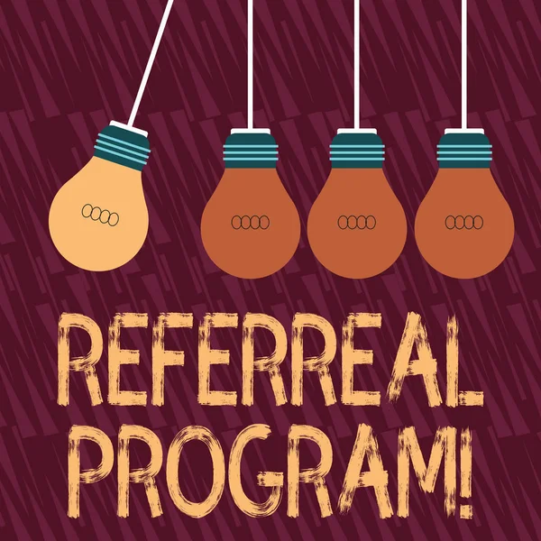 Text sign showing Referral Program. Conceptual photo internal recruitment method employed by organizations Color Incandescent Pendant Bulb Hanging with One Different Shade Lightbulb.