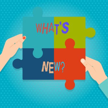 Kelime yazma metni Yeni Soru. İş konsepti, birisine şu anki canlı olayları hakkında soru sorduğunuzda dört adet boş renk yapbozu parçaları insan eli tarafından bir araya getirilir..