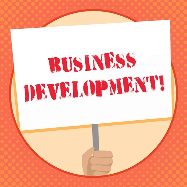 Writing note showing Business Development. Business photo showcasing pursuing strategic opportunities for a certain business Hand Holding Placard Supported by Handle Social Awareness. — Stock Photo, Image