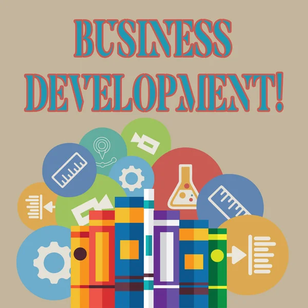 Word writing text Business Development. Business concept for pursuing strategic opportunities for a certain business Books Arranged Standing Up in Row with Assorted Educational Icons Behind. — Stock Photo, Image
