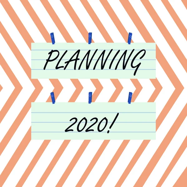 Writing note showing Planning 2020. Business photo showcasing process of making plans for something next year Strip Size Lined Paper Sheet Hanging. — Φωτογραφία Αρχείου