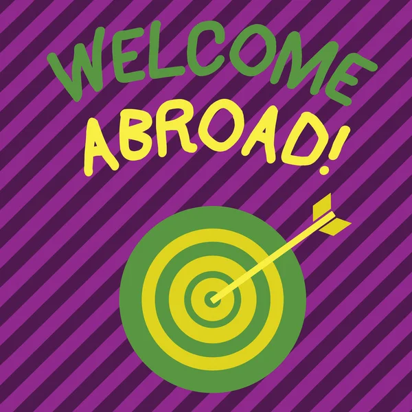 Word writing text Welcome Abroad. Business concept for something that you say when someone gets on ship Color Dart Board in Concentric Style with Arrow Hitting the Center Bulls Eye. — стокове фото