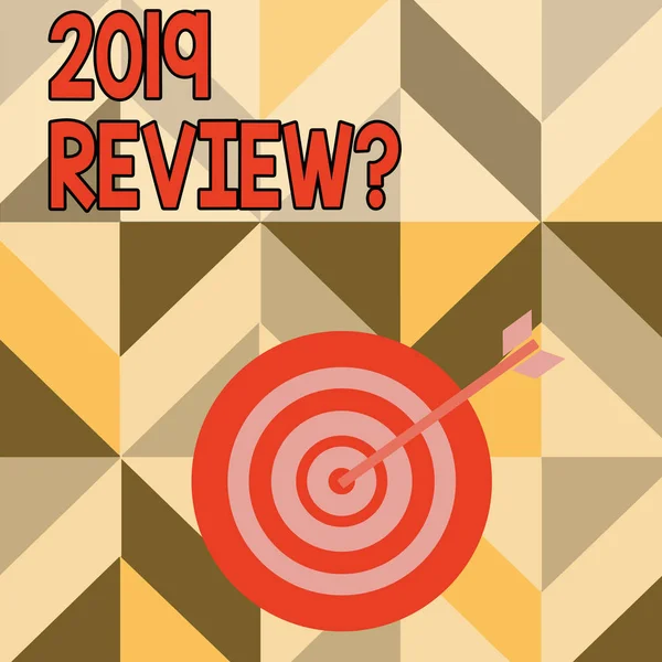 Word writing text 2019 Review Question. Business concept for remembering past year events main actions or good shows Color Dart Board in Concentric Style with Arrow Hitting the Center Bulls Eye. — 스톡 사진