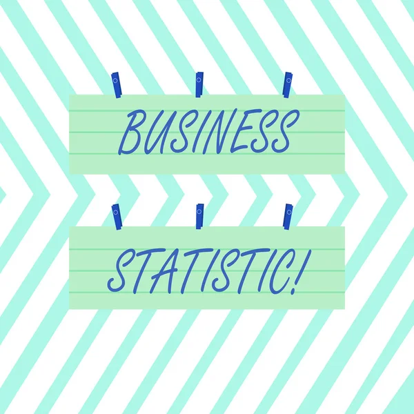 Word writing text Business Statistic. Business concept for science of accurate and very quick decision makings Two Color Blank Strip Size Lined Paper Sheet Hanging Using Blue Clothespin. — 图库照片