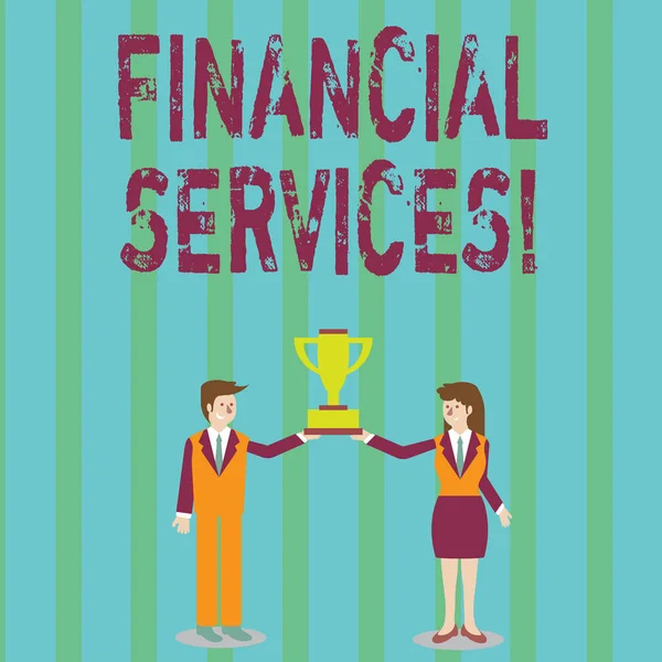 Handwriting text Financial Services. Concept meaning economic services provided by the finance industry Man and Woman in Business Suit Holding Together the Championship Trophy Cup.