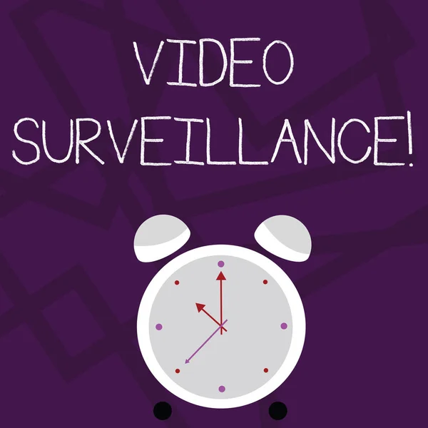 Writing note showing Video Surveillance. Business photo showcasing system of monitoring activity in an area or building Colorful Round Analog Two Bell Alarm Desk Clock with Seconds Hand photo.