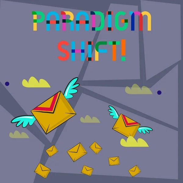Slovo psaní textu Paradigm Shift. Obchodní koncept pro zásadní změnu v přístupu nebo základní předpoklady Mnoho barevných Letecký dopis Obálky a dva z nich s křídly. — Stock fotografie