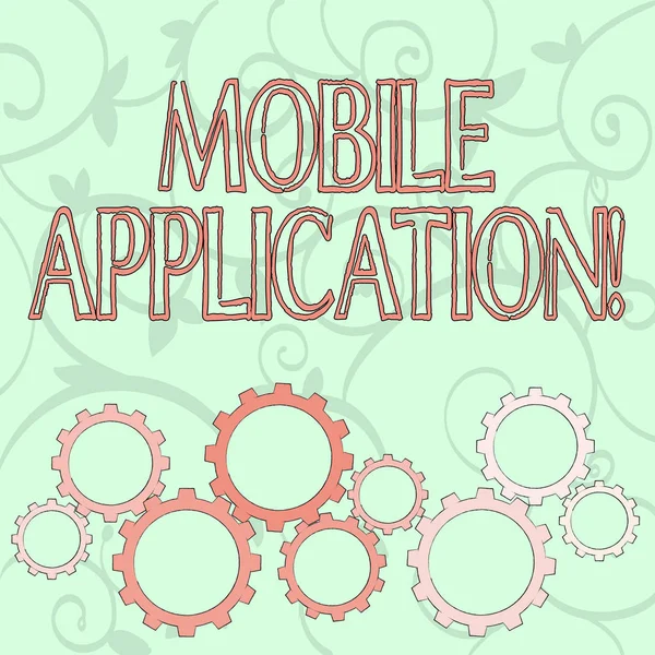 Writing note showing Mobile Application. Business photo showcasing application software designed to run on a mobile device Colorful Cog Wheel Gear Engaging, Interlocking and Tesselating.