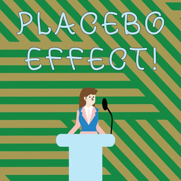 Tekst teken met placebo-effect. Conceptuele foto een gunstig effect geproduceerd door een placebo drug of behandeling zakenvrouw staande achter podium rostrum spreken op draadloze microfoon. — Stockfoto