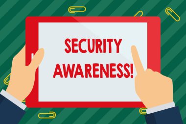 Sözcük Yazma Güvenliği Farkındalığı. Çalışanların bilgisayar güvenliği işadamı El Tutma, İşaret ve Dokunma Renkli Tablet Ekranı hakkında eğitilmesi konsepti.