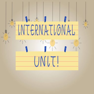 Uluslararası Birimi gösteren bir not yazıyorum. Uluslararası kabul görmüş bir maddenin miktarını gösteren iş fotoğrafı. Strip Boyutu Lined Kağıt Çarşaf Asma Mavi Mandal Kullanılarak.