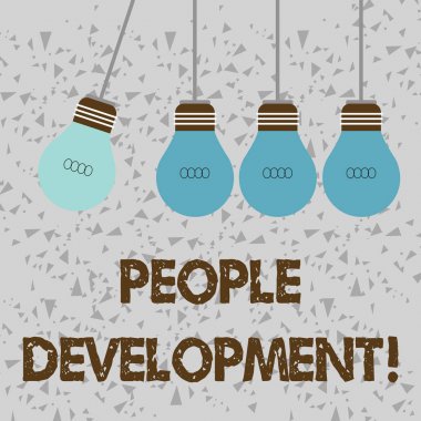 Word writing text People Development. Business concept for Encouraging employees to acquire new or advanced skills Color Incandescent Pendant Bulb Hanging with One Different Shade Lightbulb.
