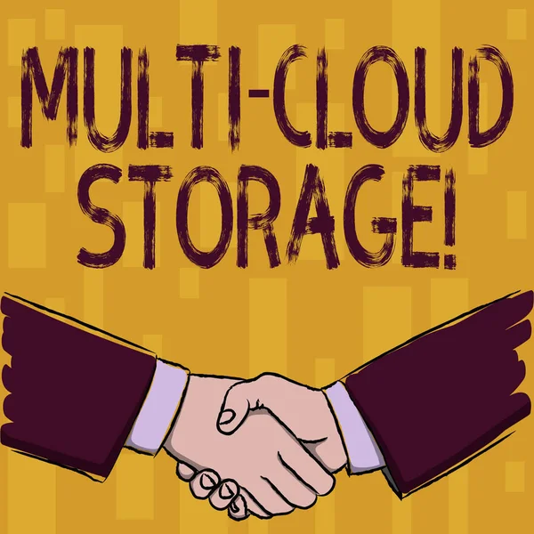 Writing note showing Multi Cloud Storage. Business photo showcasing use of multiple cloud computing and storage services Businessmen Shaking Hands Form of Greeting and Agreement.