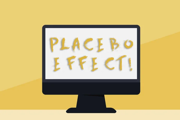 Texto escrito palavra Efeito Placebo. Conceito de negócio para um efeito benéfico produzido por uma droga placebo ou tratamento em branco espaço desktop computador monitor colorido tela autônoma na tabela . — Fotografia de Stock