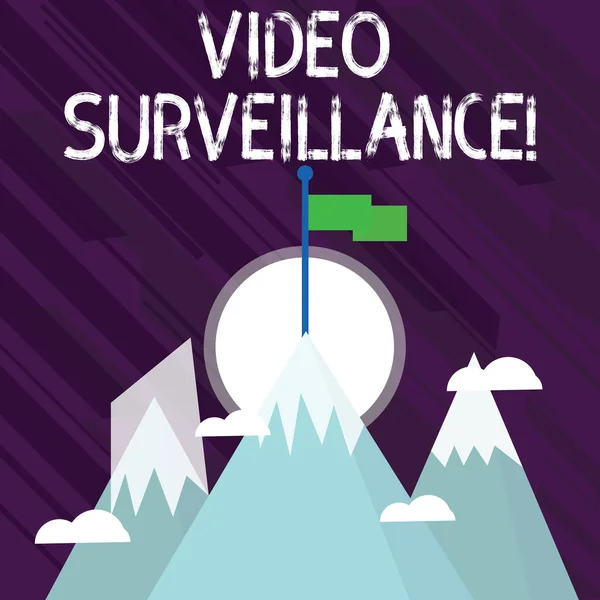 Word writing text Video Surveillance. Business concept for system of monitoring activity in an area or building Three High Mountains with Snow and One has Blank Colorful Flag at the Peak. — Stock Photo, Image