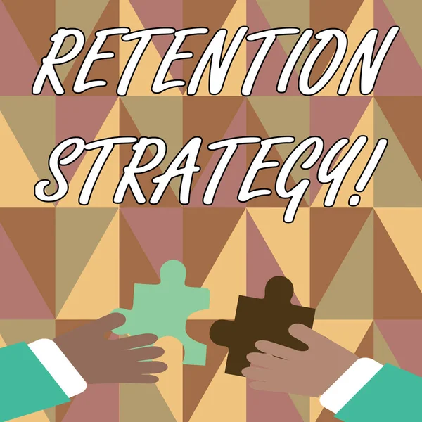 Handwriting text writing Retention Strategy. Concept meaning activities to reduce employee turnover and attrition Two Hands Holding Colorful Jigsaw Puzzle Pieces about to Interlock the Tiles.