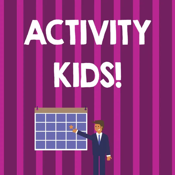 Word writing text Activity Kids. Business concept for form of organized supervised often extracurricular recreation Businessman Smiling and Pointing to Colorful Calendar with Star Hang on Wall. — 스톡 사진
