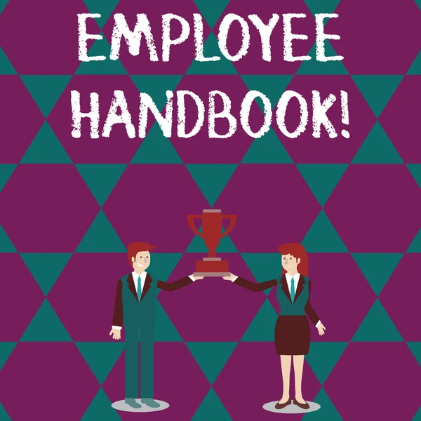 Text sign showing Employee Handbook. Conceptual photo states the rules and regulations and policies of a company Man and Woman in Business Suit Holding Together the Championship Trophy Cup. — Stock Photo, Image