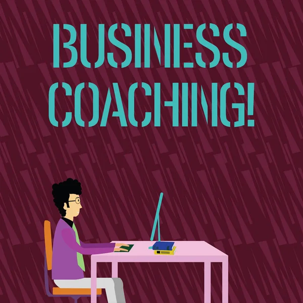 Text sign showing Business Coaching. Conceptual photo providing support and occasional advice to an individual Businessman Sitting Straight on Chair Working on Computer and Books on Table.