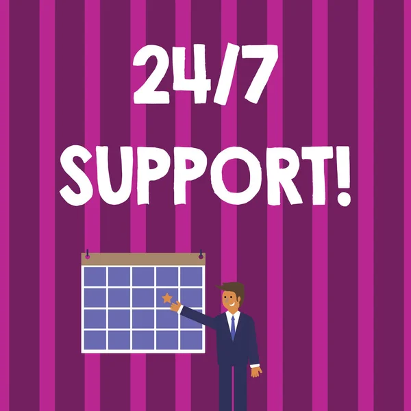 Word writing text 24 Or 7 Support. Business concept for twentyfour hours seven days a week support to client Businessman Smiling and Pointing to Colorful Calendar with Star Hang on Wall.