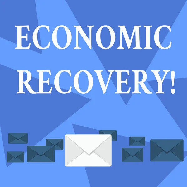 Writing note showing Economic Recovery. Business photo showcasing rise of business activity signaling the end of a recession Color Envelopes in Different Sizes with Big one in Middle. — Stock Photo, Image