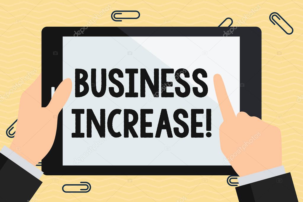Conceptual hand writing showing Business Increase. Business photo text improving some measure of an enterprise s is success Hand Holding Pointing Touching Color Tablet White Screen.