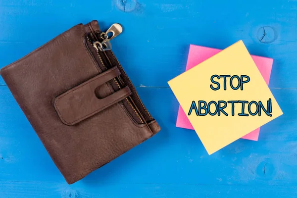 Sinal de texto mostrando Stop Abortion. Foto conceitual para parar o procedimento médico que costumava terminar uma gravidez . — Fotografia de Stock