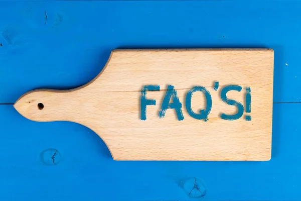 Konceptuella handskrift visar FAQ S. affärs foto text lista över frågor och svar som rör ett visst ämne. — Stockfoto