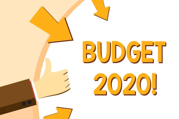Writing note showing Budget 2020. Business photo showcasing estimate of income and expenditure for next or current year Hand Gesturing Thumbs Up and Holding Round Shape with Arrows.