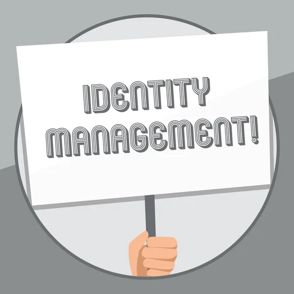 Word writing text Identity Management. Business concept for administration of individual identities within a system Hand Holding Blank White Placard Supported by Handle for Social Awareness.