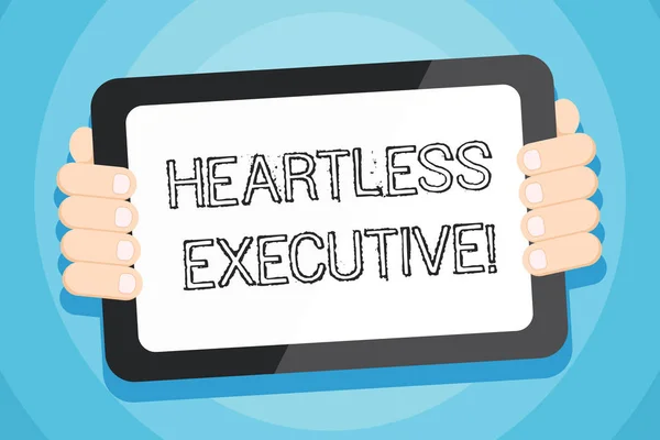 Text sign showing Heartless Executive. Conceptual photo workmate showing a lack of empathy or compassion Color Tablet Smartphone with Blank Screen Handheld from the Back of Gadget.