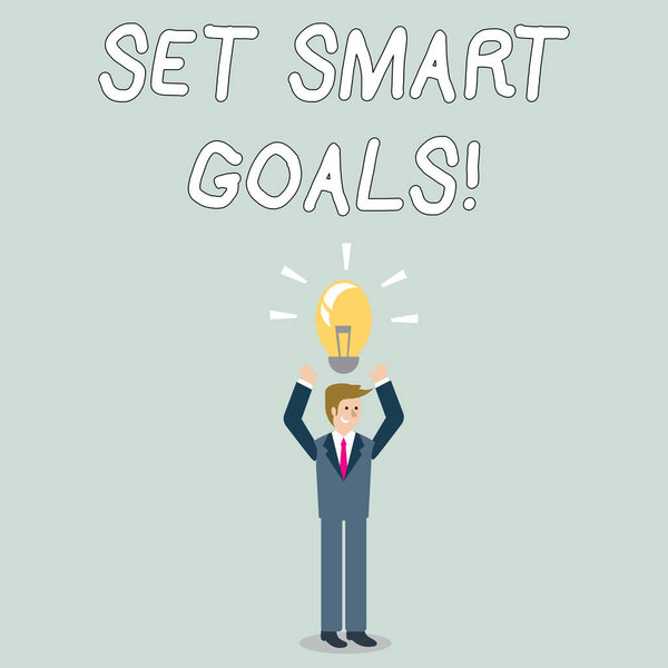 Word writing text Set Smart Goals. Business concept for list to clarify your ideas focus efforts use time wisely Businessman Standing Raising Arms Upward with Lighted Bulb Icon on his Head.
