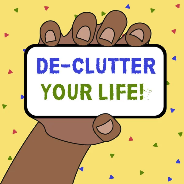 Escrevendo uma nota mostrando De Clutter Your Life. Foto de negócios mostrando remover itens desnecessários de lugares desarrumados ou superlotados . — Fotografia de Stock