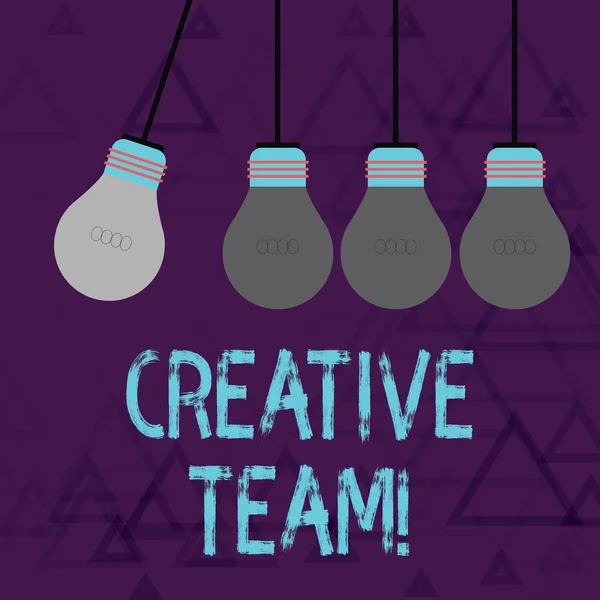 Writing note showing Creative Team. Business photo showcasing Group of showing that comes up with the advertising ideas Color Pendant Bulb Hanging with One Different Shade Lightbulb. — 스톡 사진